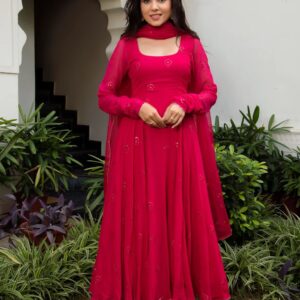 Elegant traditional Anarkali suit with intricate embroidery and flowing design, perfect for festive or formal occasions