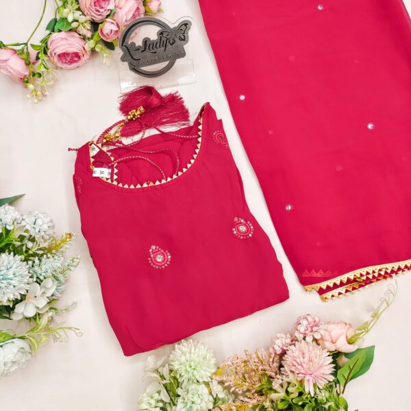 Elegant traditional Anarkali suit with intricate embroidery and flowing design, perfect for festive or formal occasions